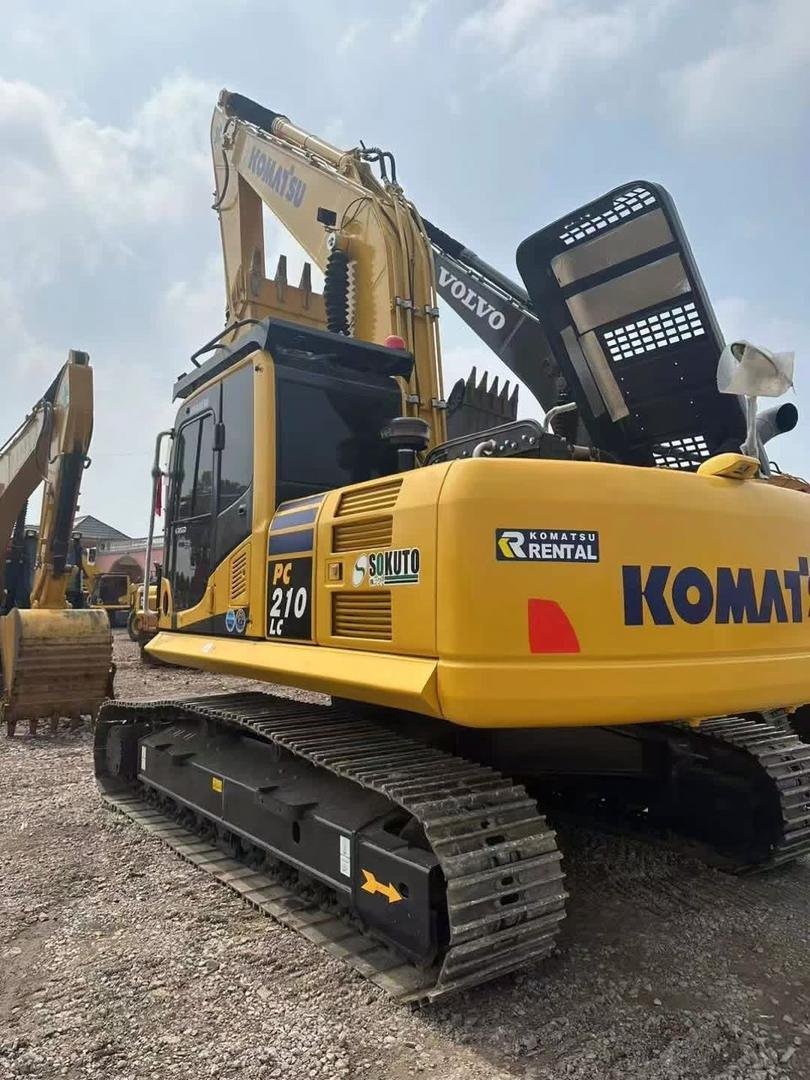 A Komatsu PC210LC tracked excavator on the LAMM Investment yard.
