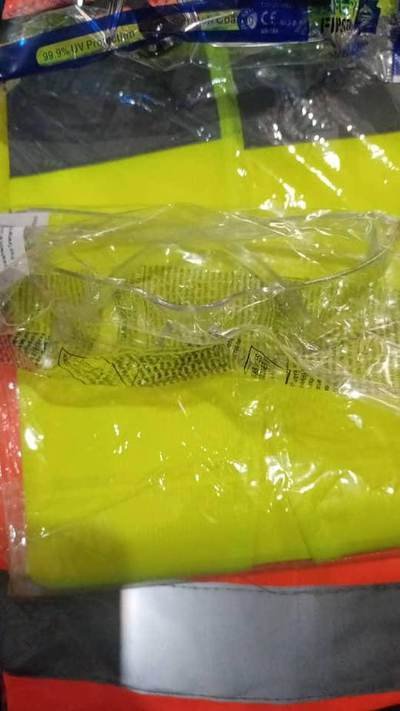 Goggles and hi-vis vests — site ppe held by LAMM Investment Company.